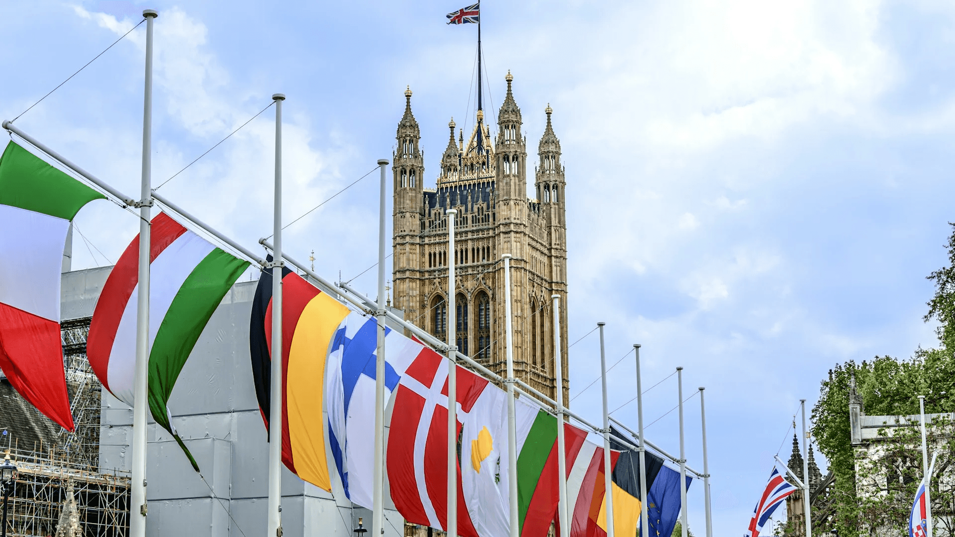 European flags arrayed in front of the Victoria Tower, Palace of Westminster.